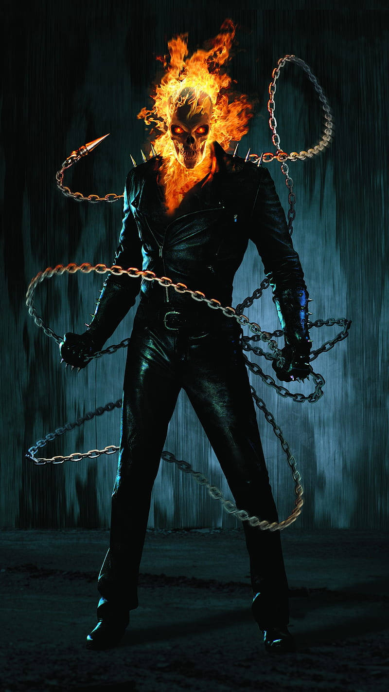 Ghost Rider 燃燒的頭顱和鎖鏈，雨夜場景 — 鬼 Rider 壁紙
