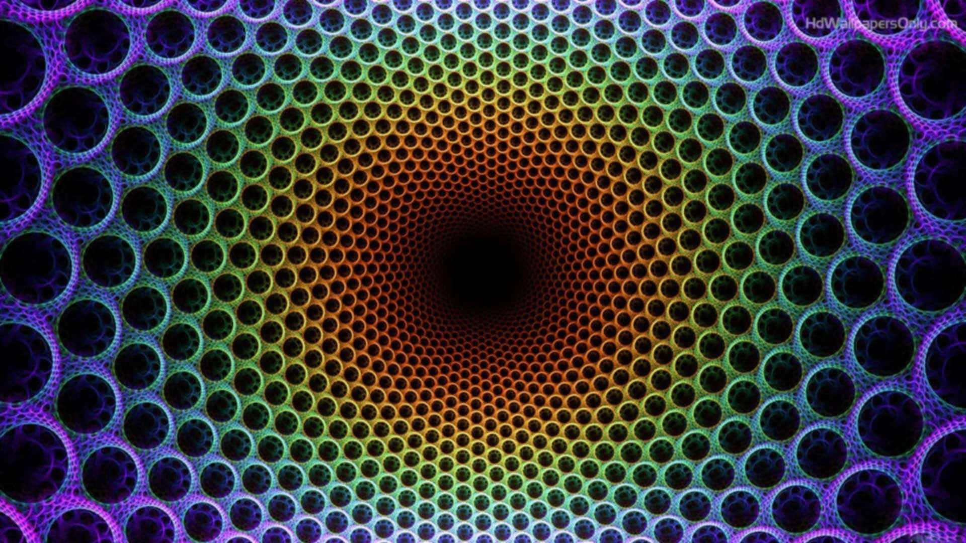 幻覺 桌布 壁紙 — 一個迷人的催眠圖案，由同心圓組成，向黑暗中心散發出彩虹色調。