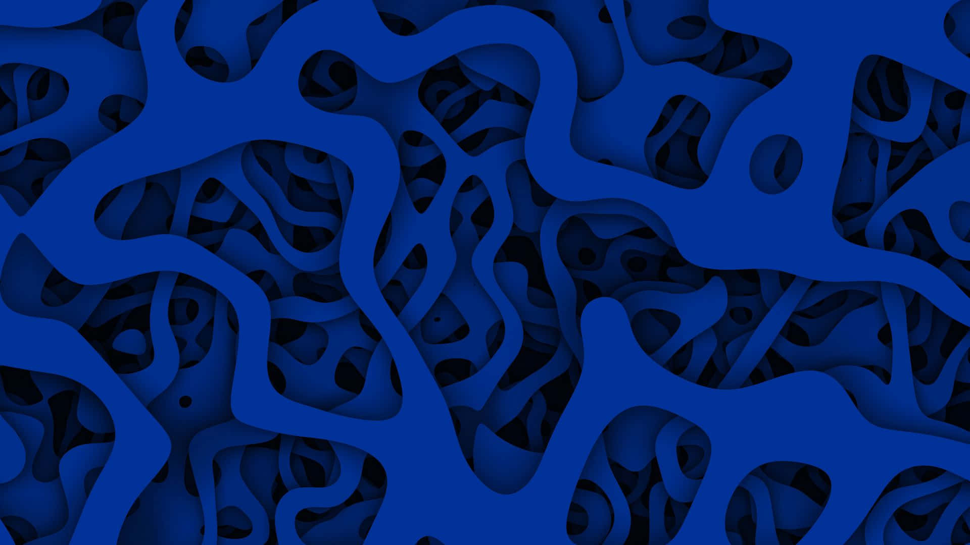 Pattern Desktop 桌布 壁紙 — 一個迷人的抽象圖案，由流動的藍色形狀組成，具有層次深度和陰影空隙。