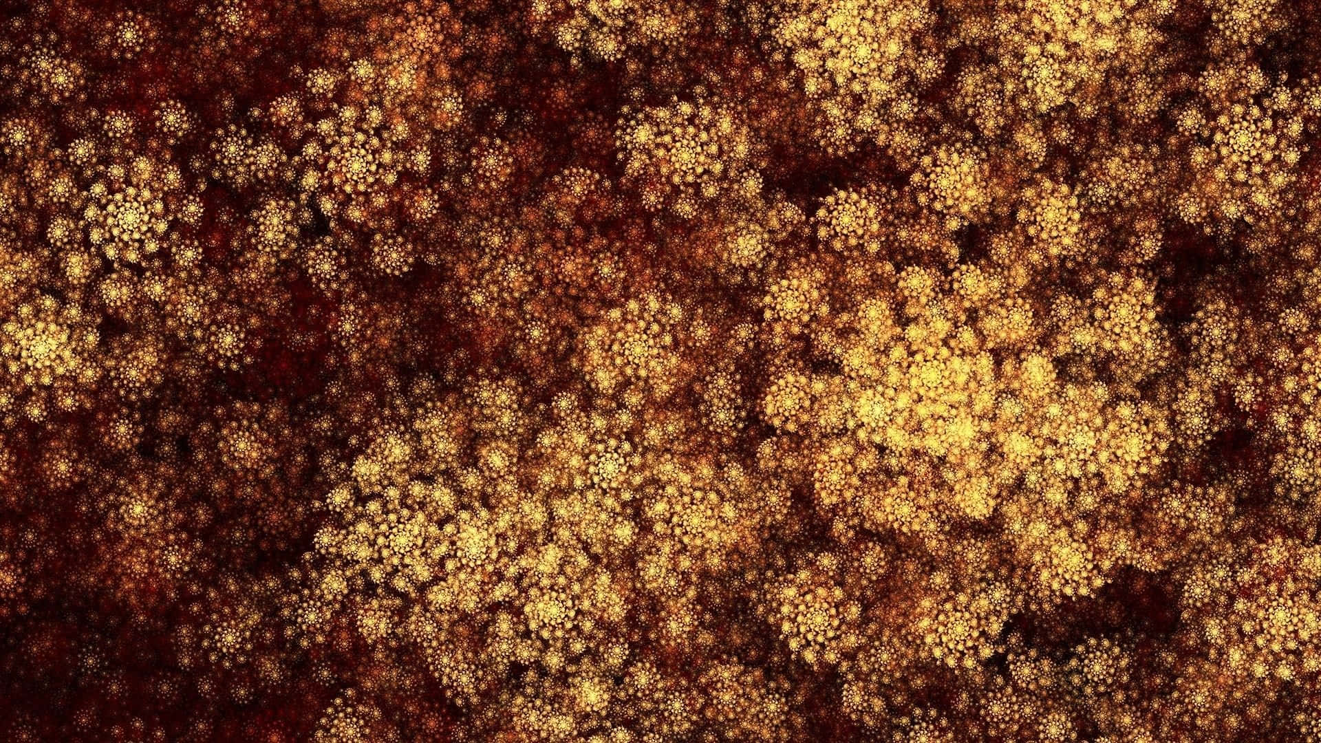 Orange Glitter 桌布 壁紙 — 一個迷人的抽象圖案，由發光的金色球體聚集在深棕色背景上組成。