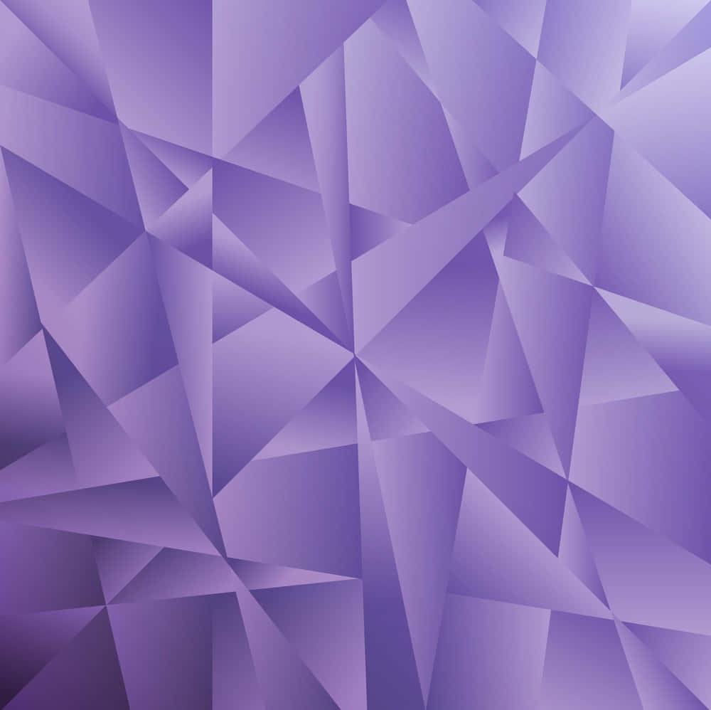 Mauve 桌布 壁紙 — 一個迷人的抽象圖案，由相互交錯的紫色三角形組成，形成帶有柔和漸變的低多邊形幾何紋理。