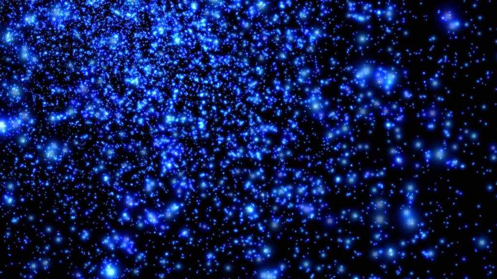 發光藍色粒子在黑暗的宇宙虛空中漂浮。