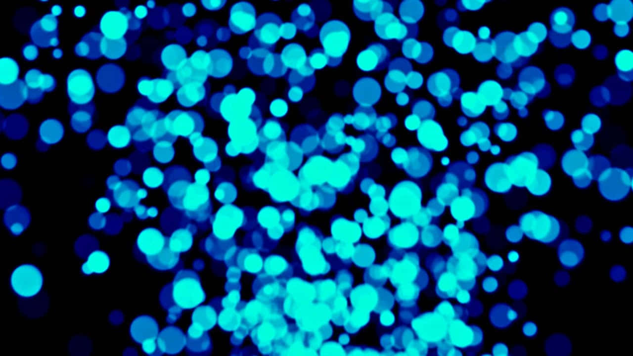 lights 桌布 壁紙 — 一個迷人的藍色散景發光燈光場，散佈在深黑色背景上。