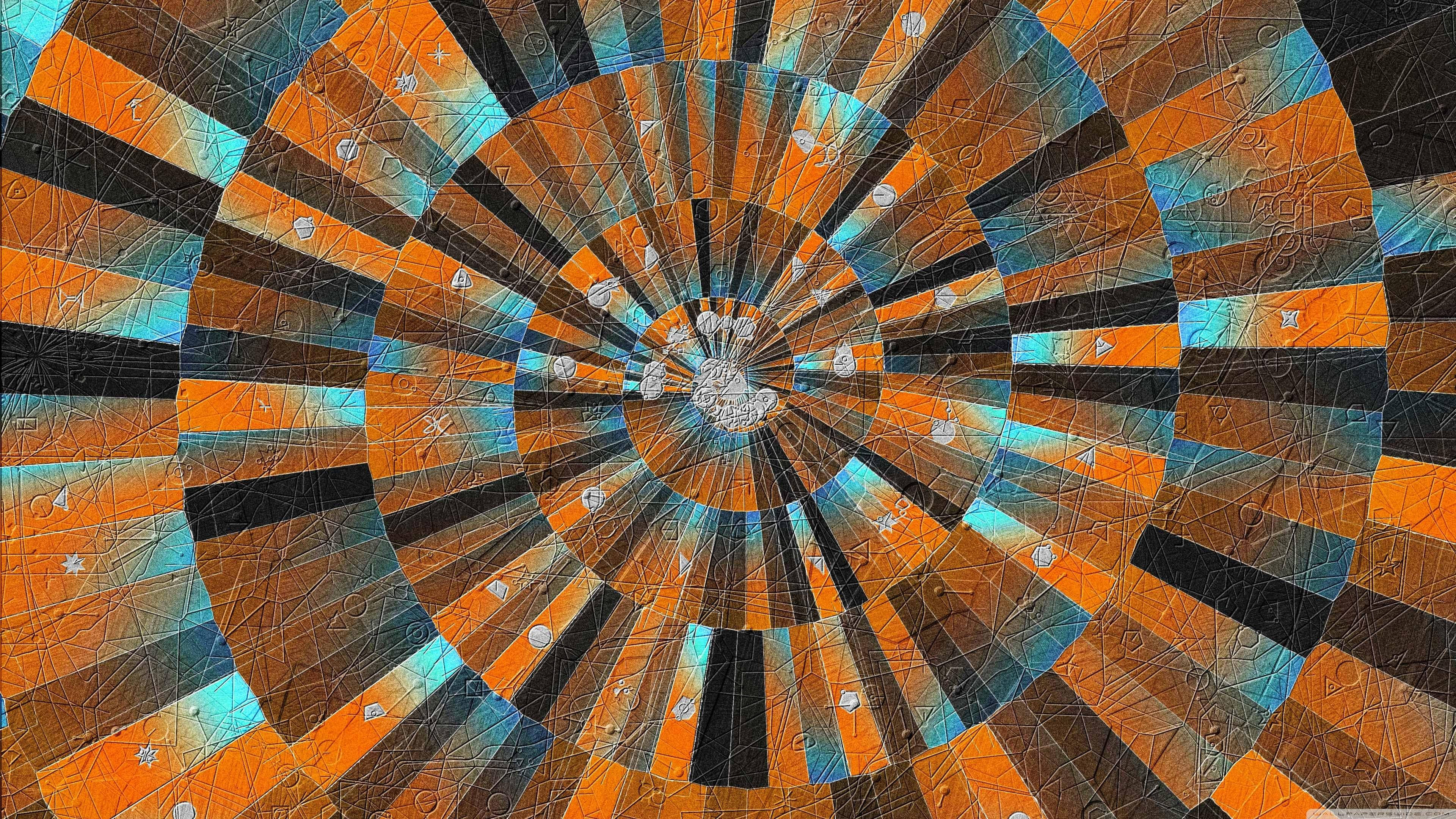 Spiral 桌布 壁紙 — 一個迷人的螺旋圖案向外輻射，帶有鮮明的橙色、藍綠色和黑色部分，點綴著微妙的符號。