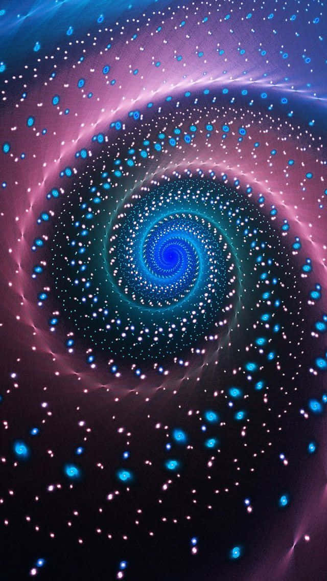 Spiral 桌布 壁紙 — 一個迷人的螺旋星系，發光的藍色和粉紅色星星旋轉成宇宙漩渦。