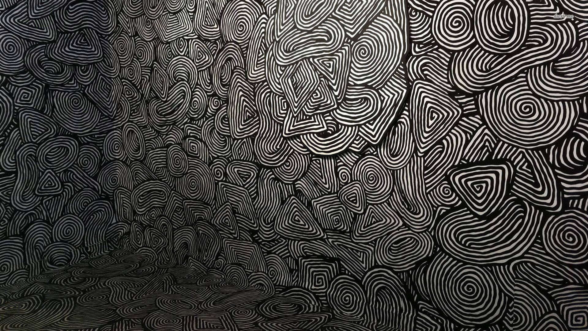 迷幻動圖 桌布 壁紙 — 一個迷人的黑白抽象圖案，由旋轉的線條和幾何形狀填滿整個畫面。