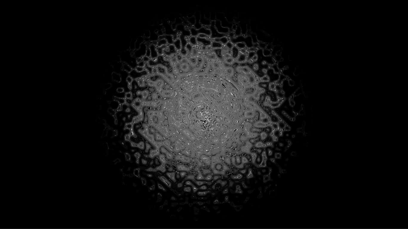 1366x768 Amoled 桌布 壁紙 — 一個迷人的黑白抽象圖案從中心點向外輻射，就像水面上凍結的漣漪。