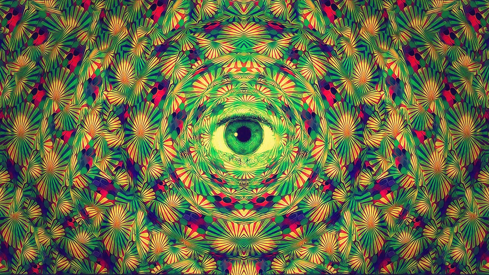 Sacred Geometry 桌布 壁紙 — 一個迷幻的萬花筒，由綠色、黃色和紅色的扇形圖案匯聚成中央發光的綠色眼睛。