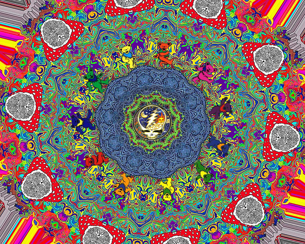Grateful Dead Bears 桌布 壁紙 — 一個迷幻萬花筒從中央的Grateful Dead骷髏標誌向外輻射，周圍環繞著旋轉的彩虹圖案和重複的紅色三角形。