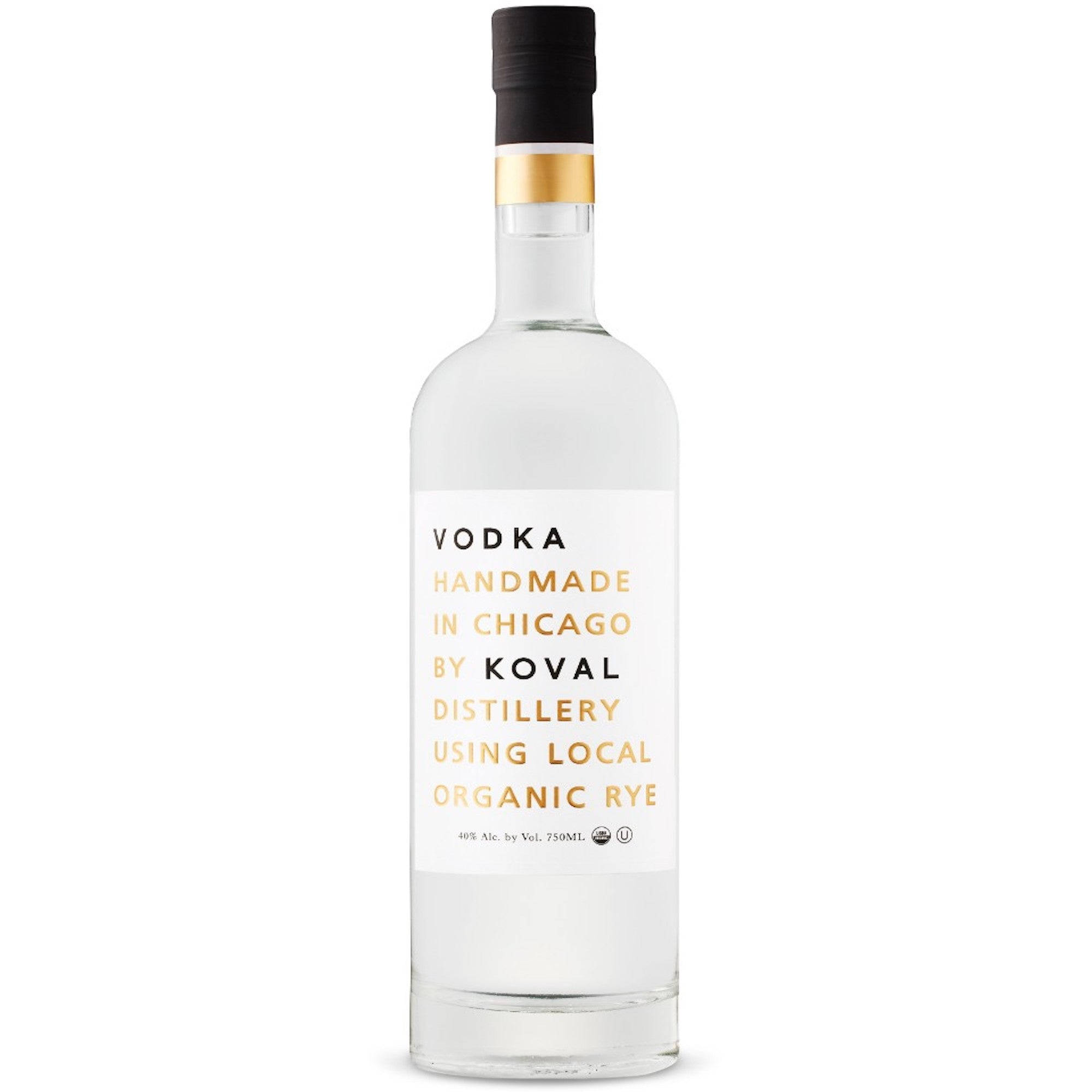 bottle 桌布 壁紙 — 一個透明玻璃瓶的Koval伏特加，帶有極簡白色標籤和金色文字，立在純白色背景前。
