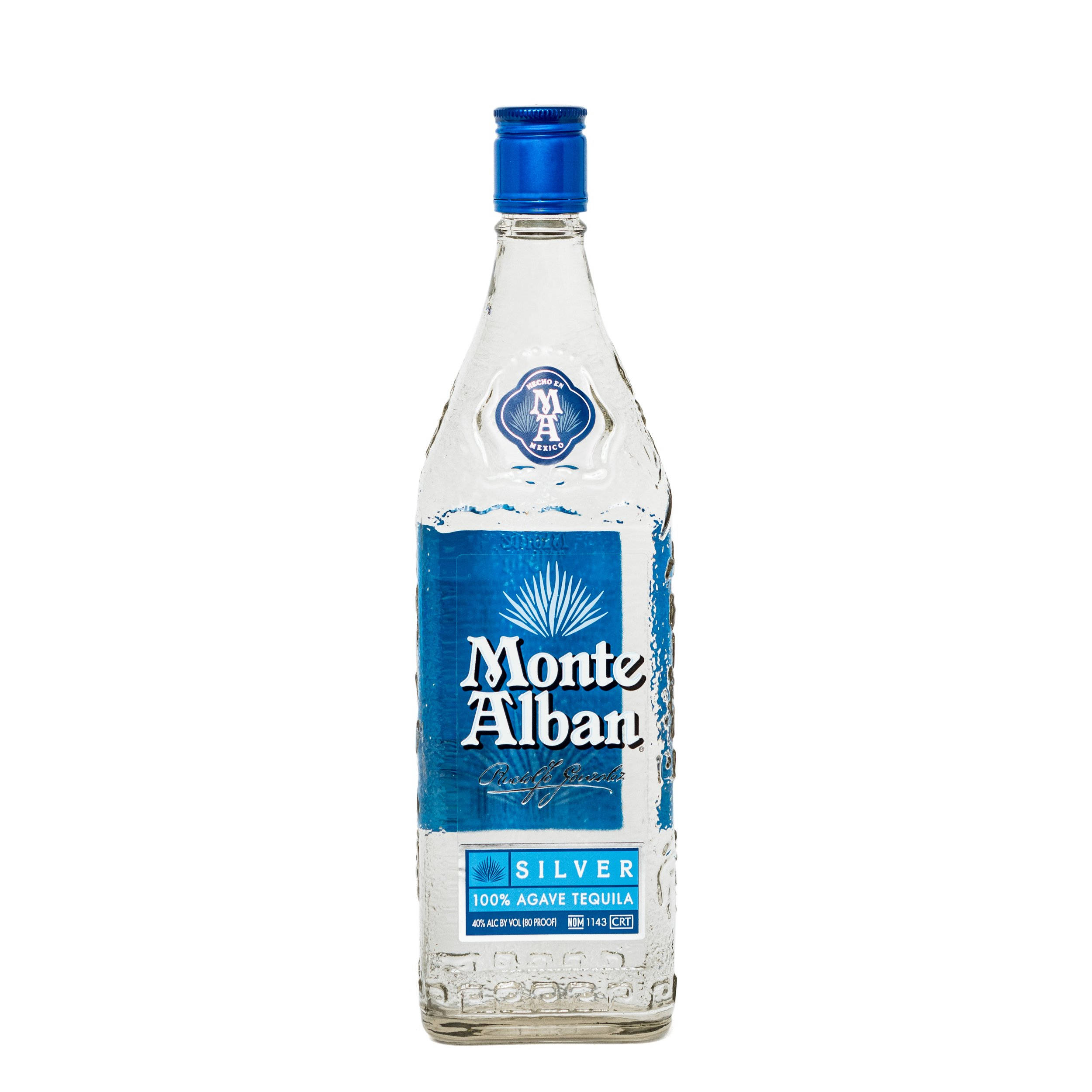 Drink 桌布 壁紙 — 一個透明玻璃瓶的Monte Alban Silver Tequila，帶有藍色瓶蓋和標籤，立在純白色背景前。