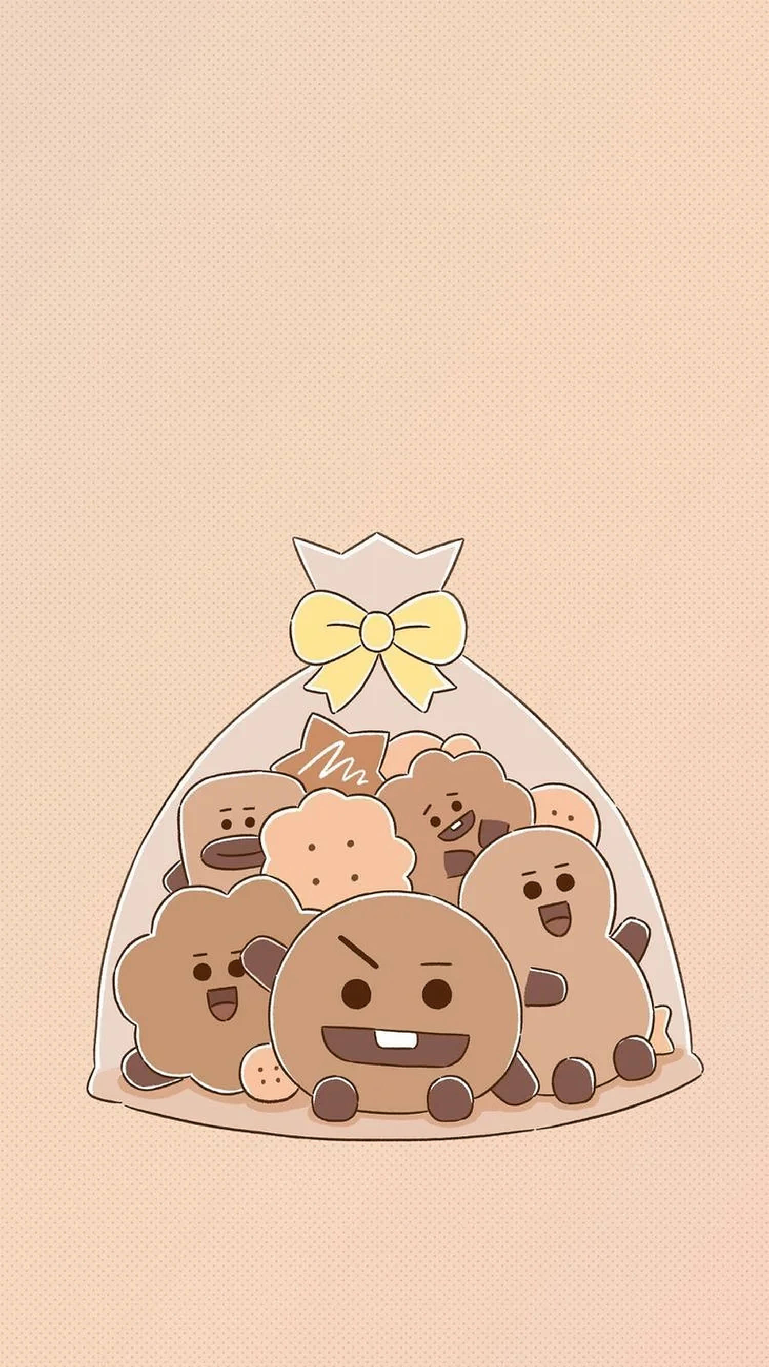 shooky bt21 桌布 壁紙 — 一個透明袋，裝滿帶有笑臉和黃色蝴蝶結的可愛卡通餅乾，背景是米色。