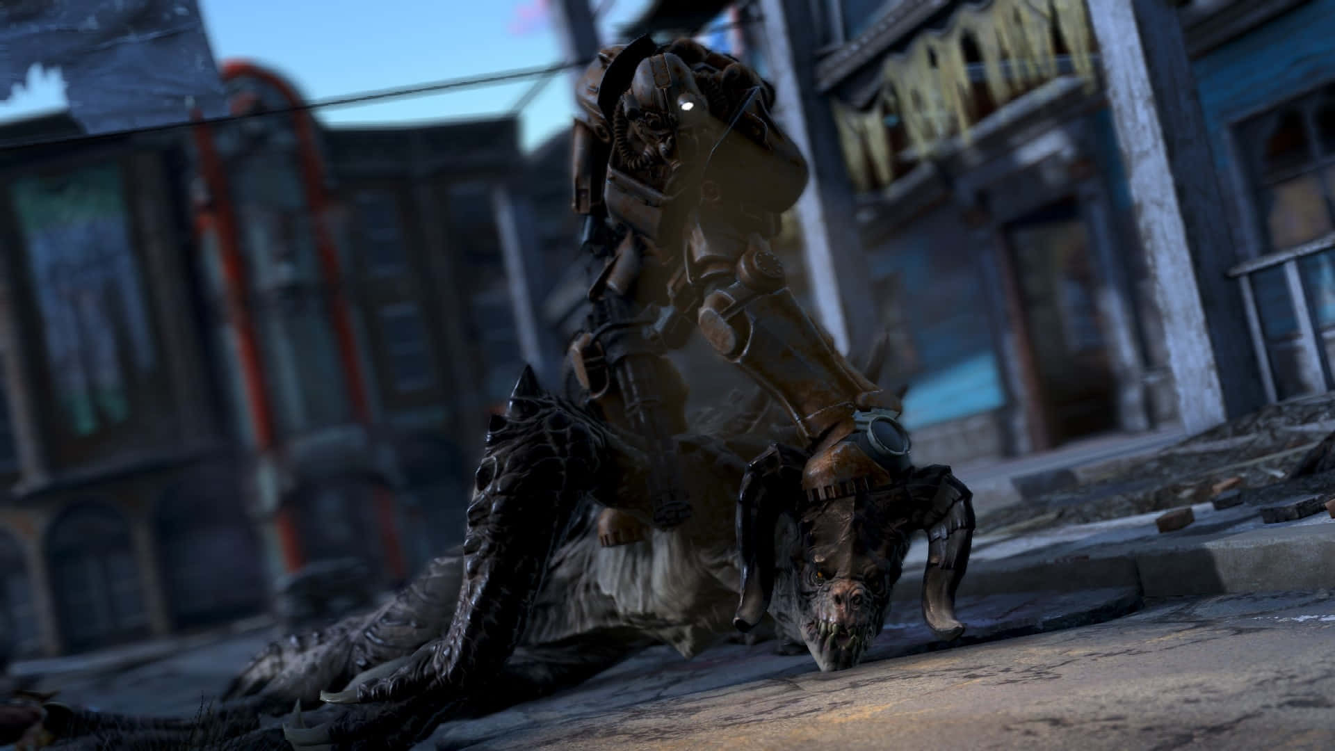 Fallout 4 Power Armor 桌布 壁紙 — 一個重裝甲機械戰士在黃昏時分站在廢墟城市小巷中一個被打敗的怪物之上。
