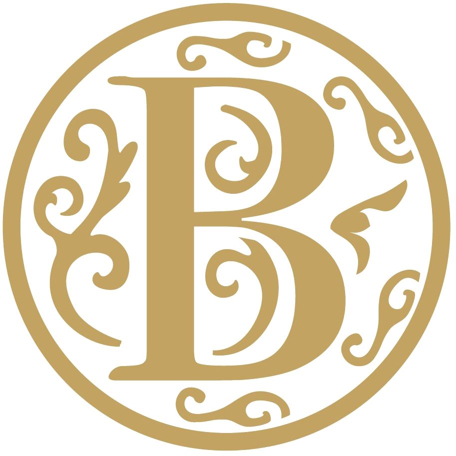 字母B 桌布 壁紙 — 一個金色華麗字母B的花押字，被一個帶有旋轉裝飾圖案的圓形框架包圍，背景是黑色。