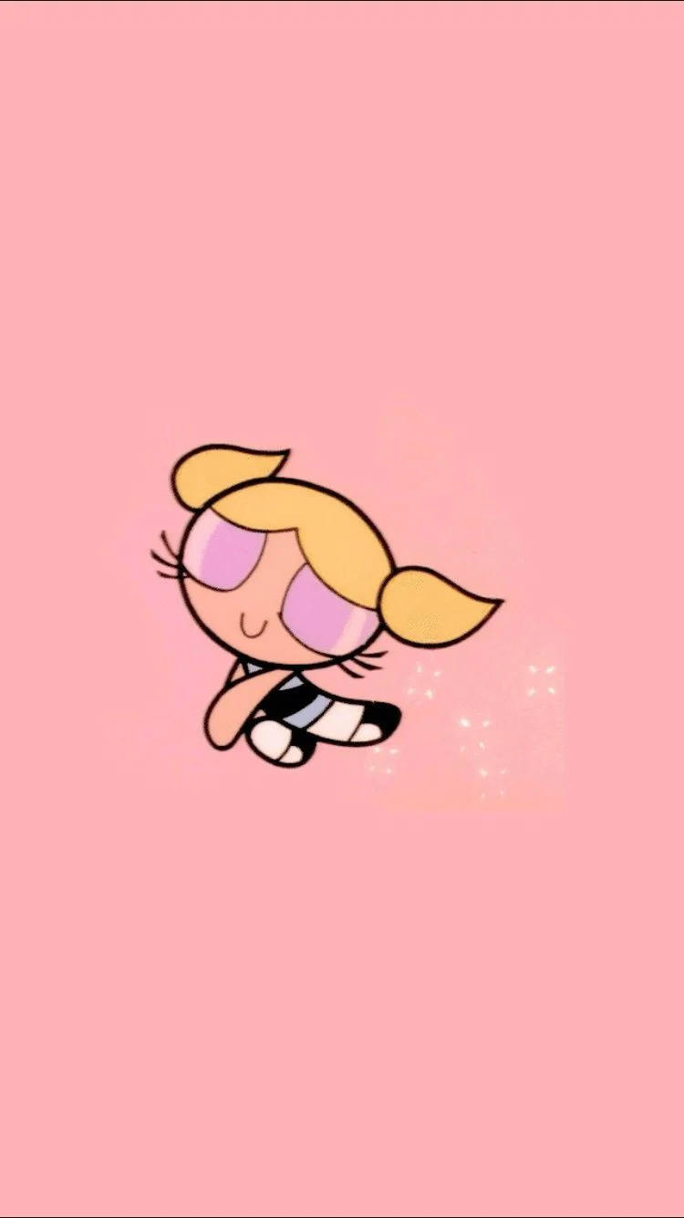 Powerpuff Girls 桌布 壁紙 — 一個金髮辮子、戴著粉紅色眼鏡的卡通女孩，在帶有閃粉的柔和粉紅色背景上輕輕漂浮。