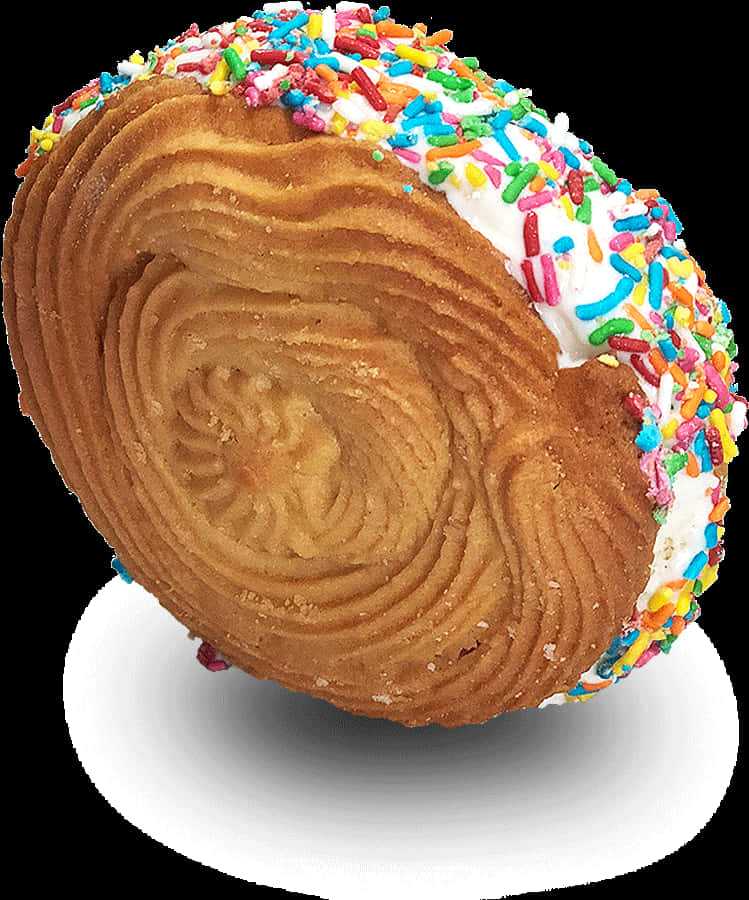 Sweets 桌布 壁紙 — 一個金黃色漩渦狀的糕點，上面有白色糖霜和彩色糖粒，放在白色盤子上。