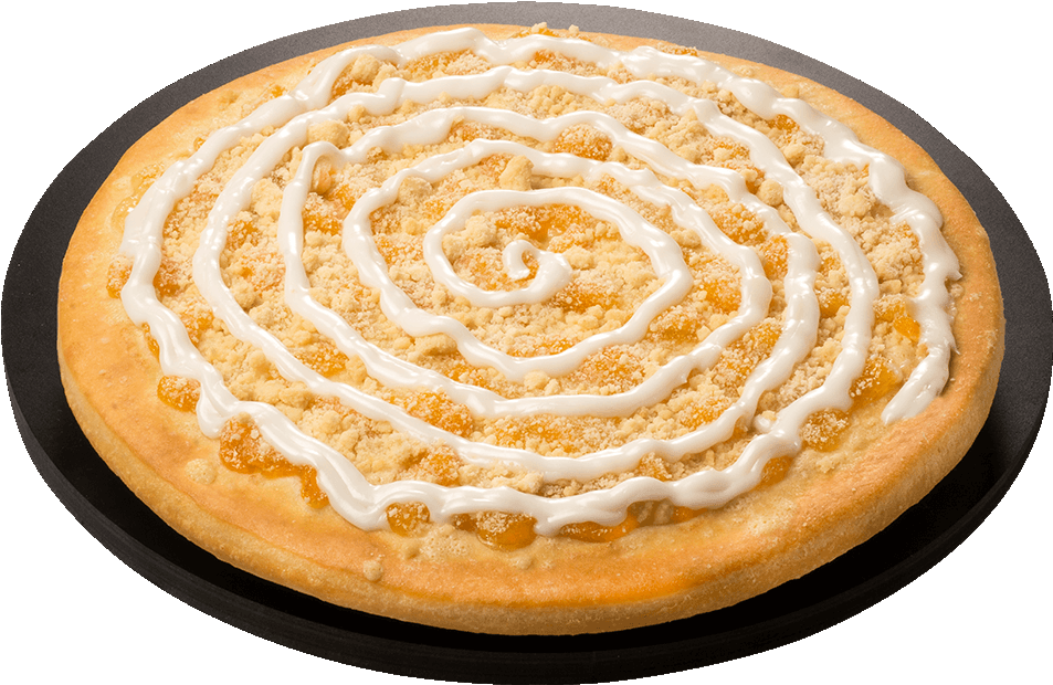 Desserts 桌布 壁紙 — 一個金黃色的披薩，上面有白色奶油漩渦和鬆脆的橙色配料，放在黑色盤子上。