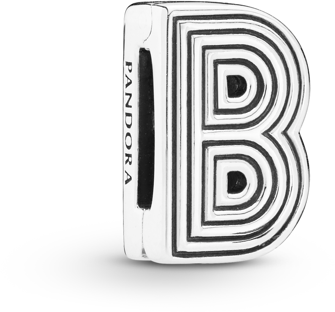 字母B 桌布 壁紙 — 一個銀色 Pandora 吊飾，形狀像字母 B，帶有同心黑白條紋，背景為黑色。