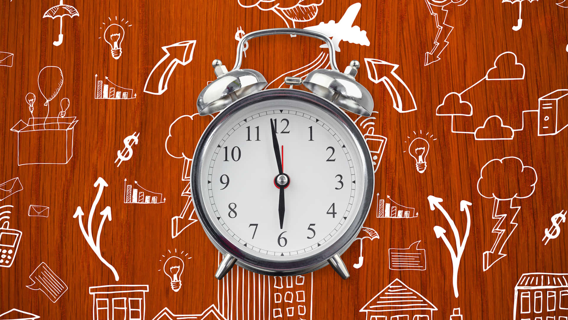 Clocks 桌布 壁紙 — 一個銀色鬧鐘放在木質表面上，帶有白色塗鴉的商業和天氣圖標。