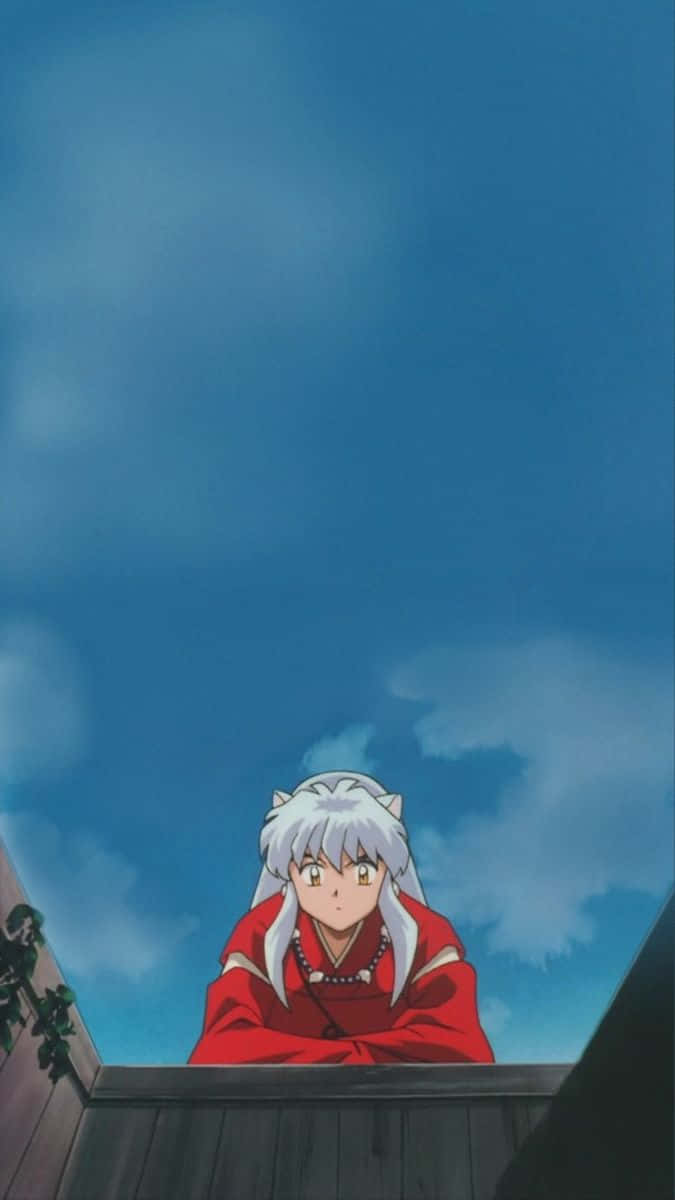 Inuyasha iPhone 桌布 壁紙 — 一個銀髮動漫角色穿著紅色和服，從木屋頂仰望廣闊的藍天，天空中有柔軟的白雲。