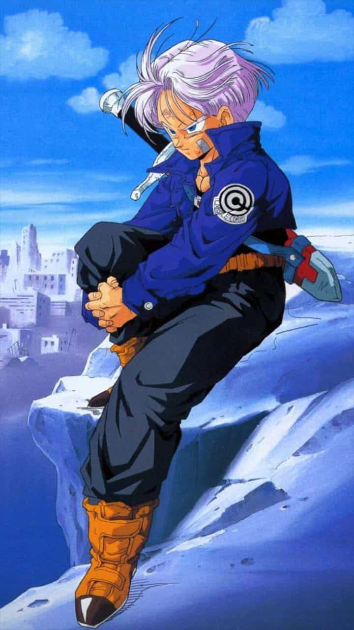 Trunks 桌布 壁紙 — 一個銀髮動漫角色穿著藍色外套，坐在白雪覆蓋的懸崖頂上，俯瞰著遠處的城市，天空湛藍。