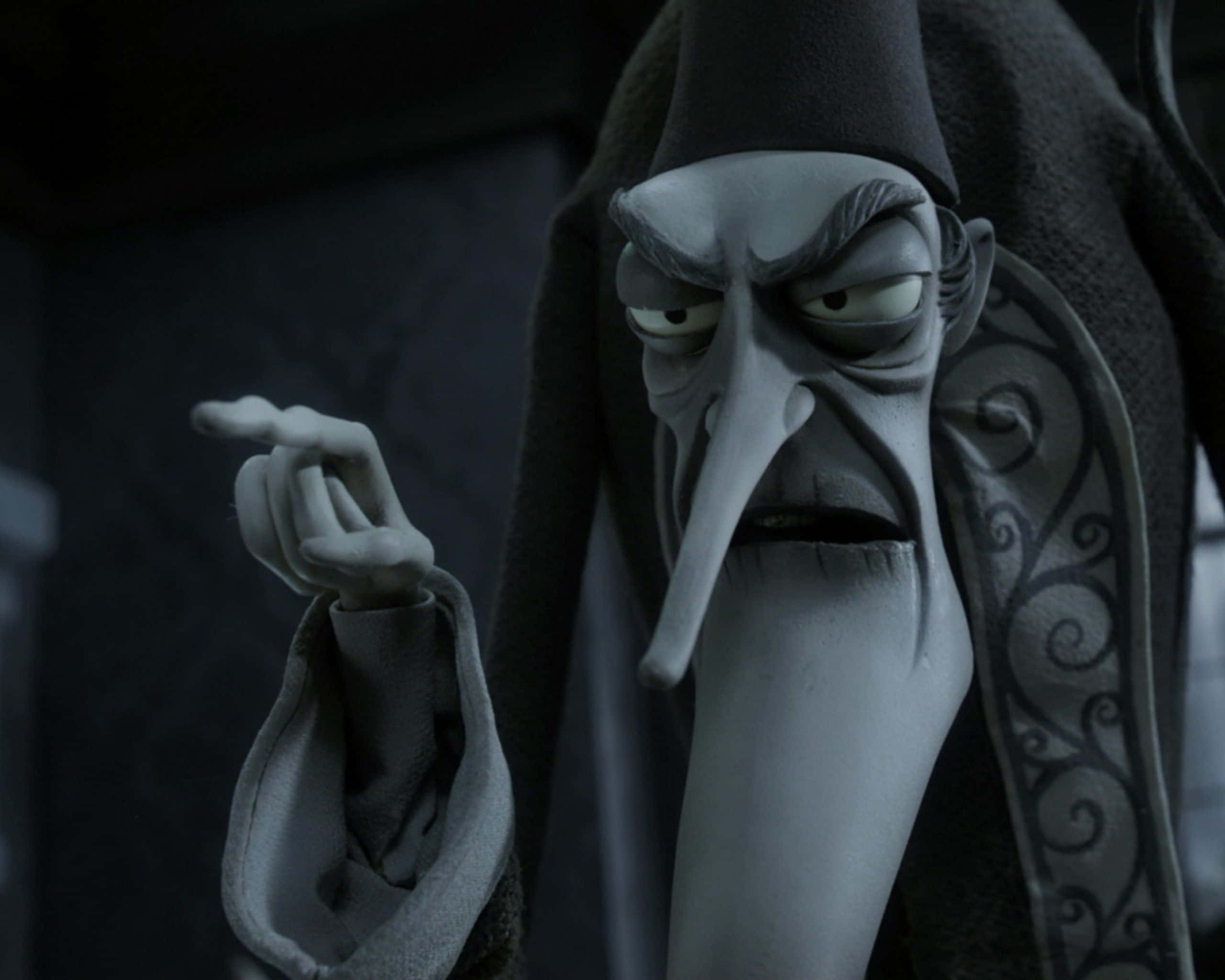 corpse bride 桌布 壁紙 — 一個長鼻子、戴尖帽的威脅性動畫角色，在昏暗場景中指控性地指著。