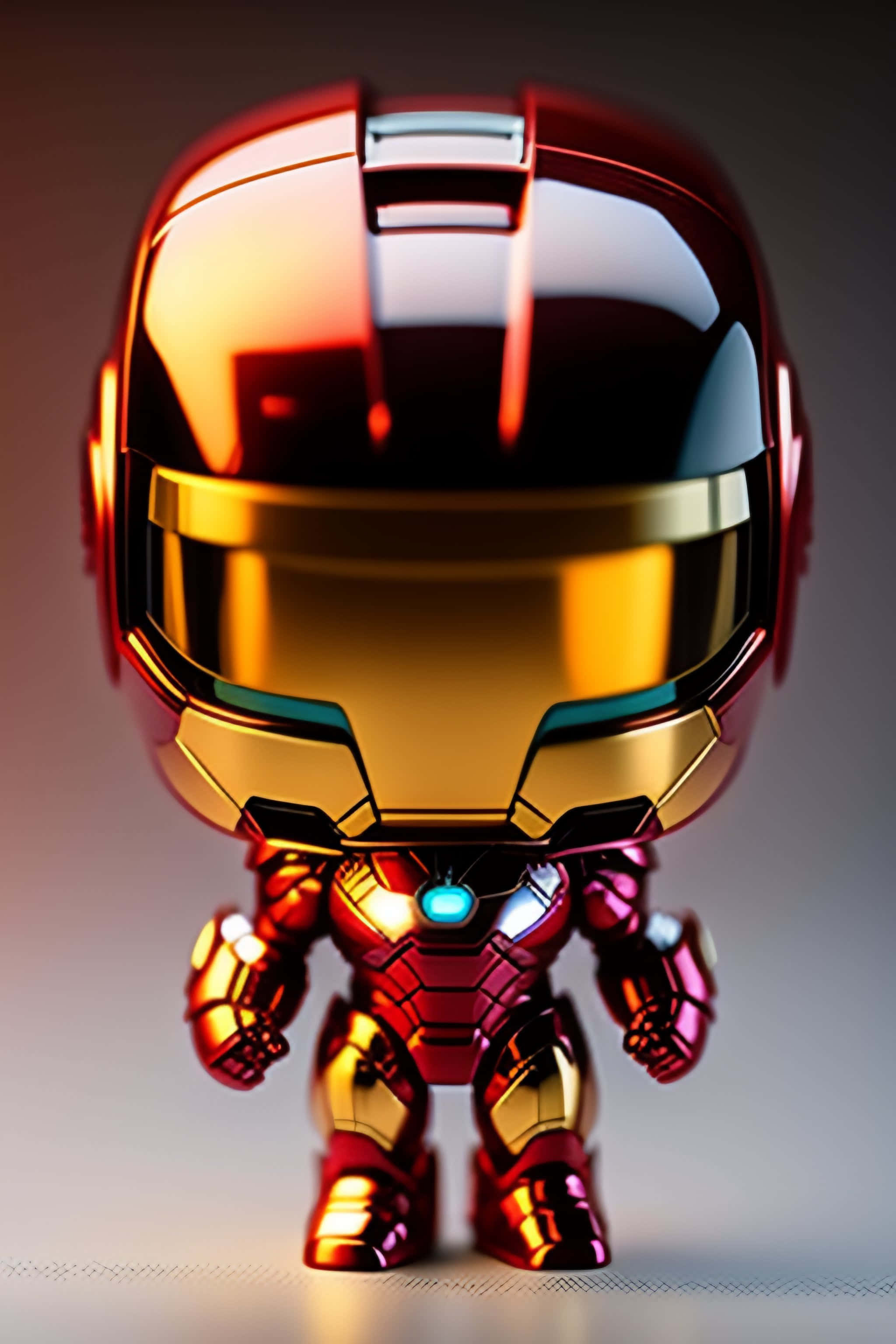 Iron Man Pop Figures 桌布 壁紙 — 一個閃亮的Q版鋼鐵人人偶，身穿紅金裝甲，胸口有發光的藍色弧形反應堆，站在柔和的漸變背景前。