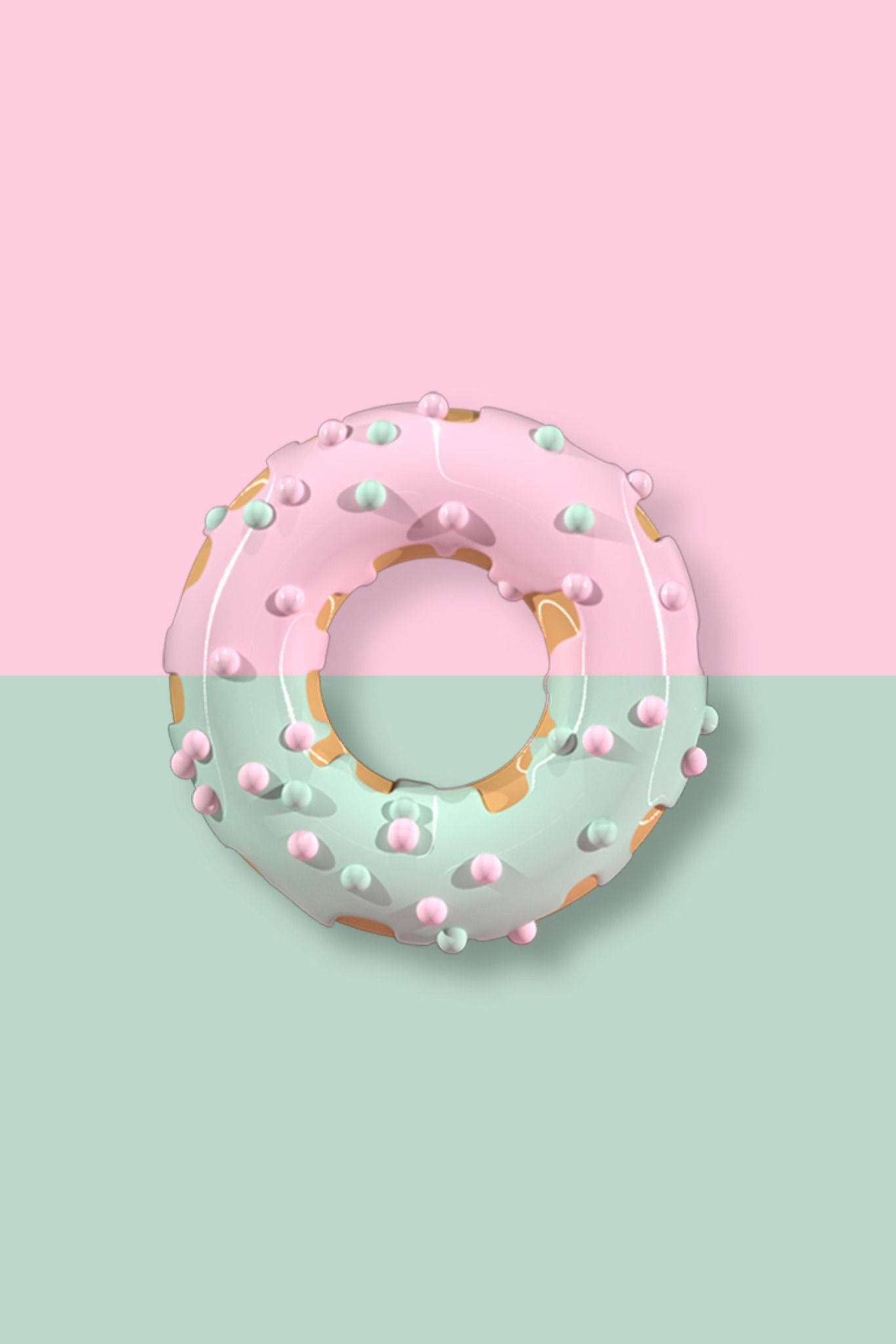 Donut 桌布 壁紙 — 一個閃亮的粉紅和薄荷色甜甜圈，上面有粉彩糖粒，漂浮在分割的粉彩背景上。