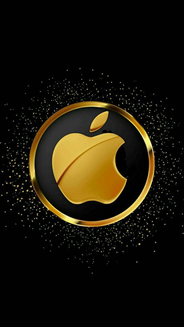 蘋果 桌布 壁紙 — 一個閃亮的金色Apple標誌位於黑色圓圈中央，閃爍的粒子在黑暗背景上向外輻射。