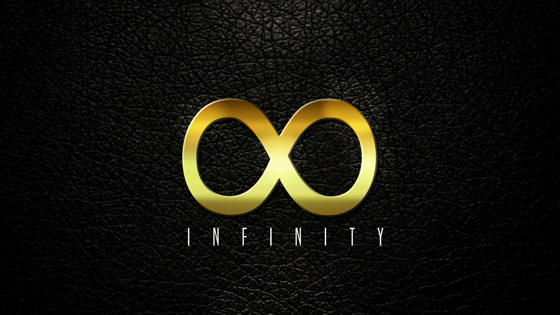Dark Infinity 桌布 壁紙 — 一個閃亮的金色無限符號放置在帶有紋理的黑色皮革上，下方有白色的infinity字樣。