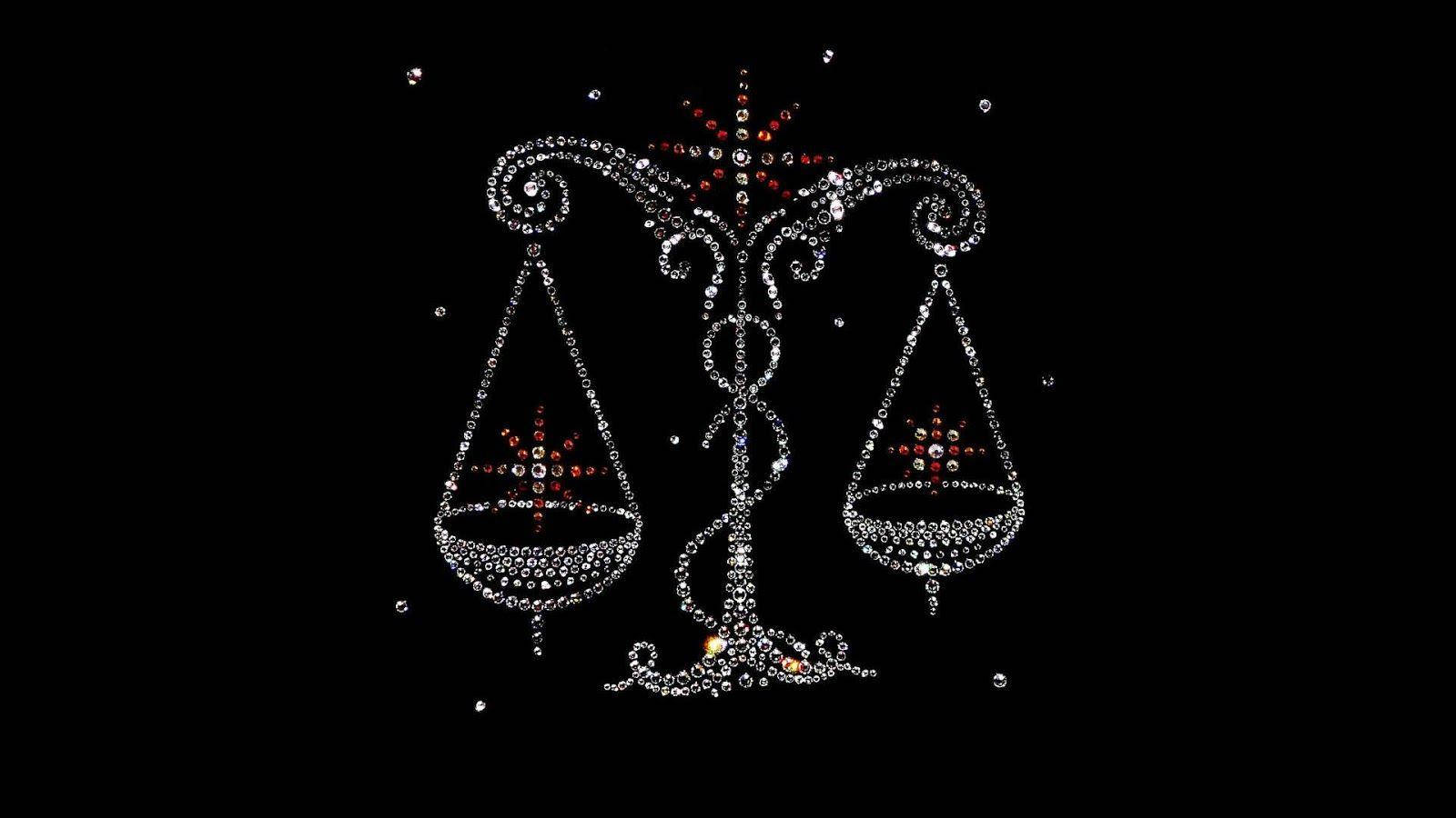 zodiac 桌布 壁紙 — 一個閃閃發光、鑲滿鑽石的天秤座星座秤在黑色背景上發光，背景散落著紅色和白色的星星。