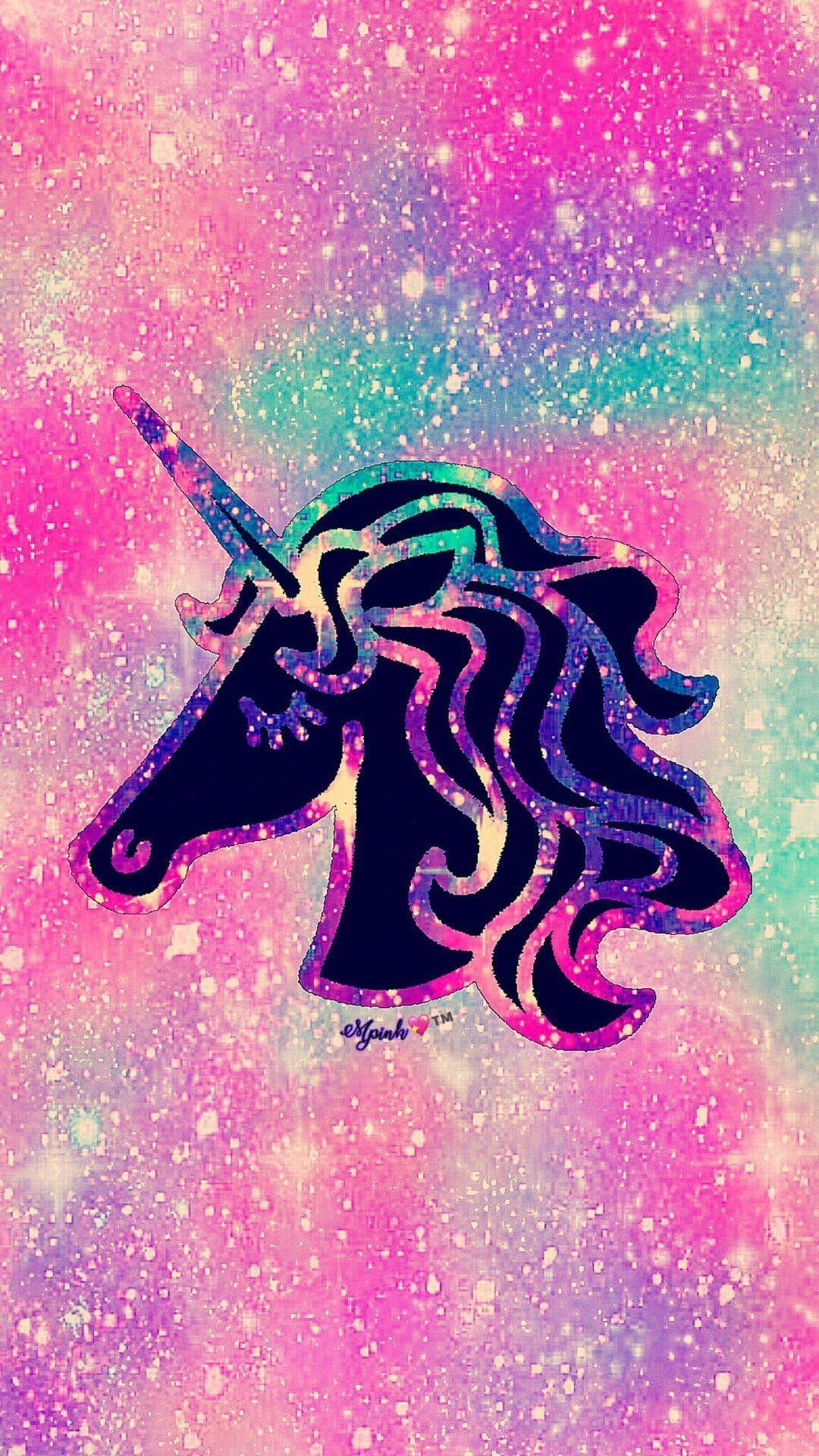 一個閃閃發光的獨角獸頭部剪影，背景是色彩繽紛的星系。 — 可愛的銀河動圖 壁紙