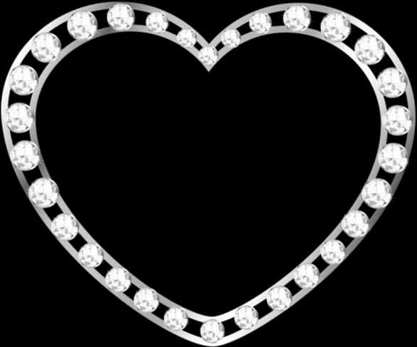 Heart Shape 桌布 壁紙 — 一個閃閃發光的銀色心形框架，飾有透明寶石，置於純黑色背景上。