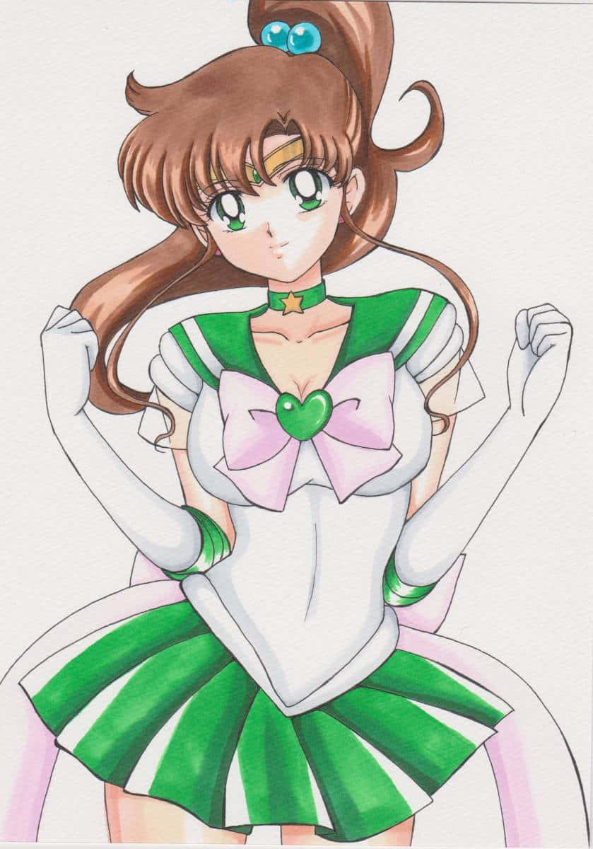 sailor jupiter 桌布 壁紙 — 一個開心的動漫女孩，穿著綠色和白色的水手服，戴著粉紅色蝴蝶結，自信地舉起拳頭擺姿勢。