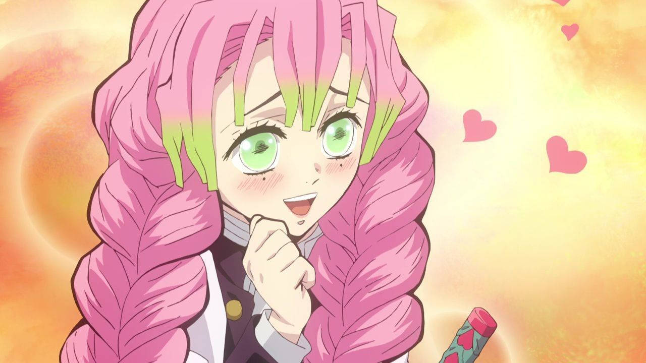 Mitsuri 桌布 壁紙 — 一個開心的動漫女孩，粉紅色辮子，綠色眼睛，微笑著托著下巴，背景溫暖發光，有心形漂浮。