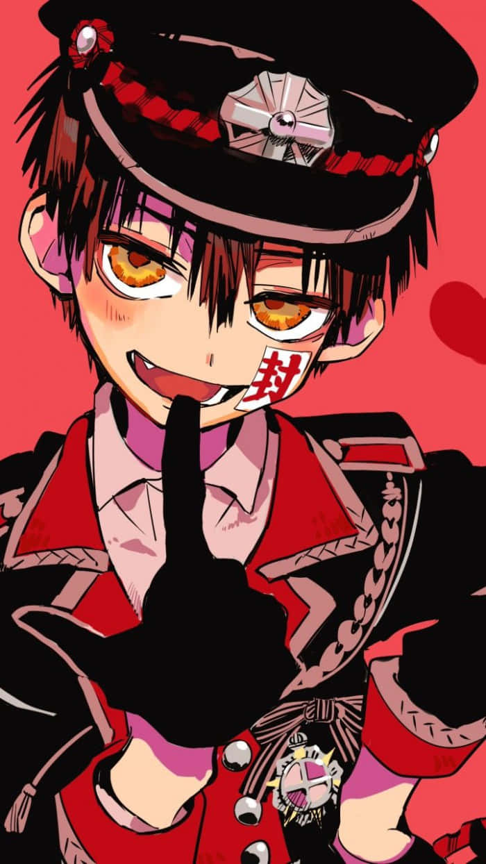 Hanako Kun 桌布 壁紙 — 一個開心的動畫男孩穿著紅黑制服，在鮮紅背景前眨眼並將手指放在嘴唇上。
