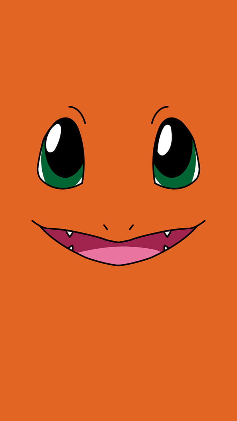 Cute Charmander 桌布 壁紙 — 一個開心的卡通Charmander臉孔，有綠色眼睛和露齒笑，在純橙色背景上。