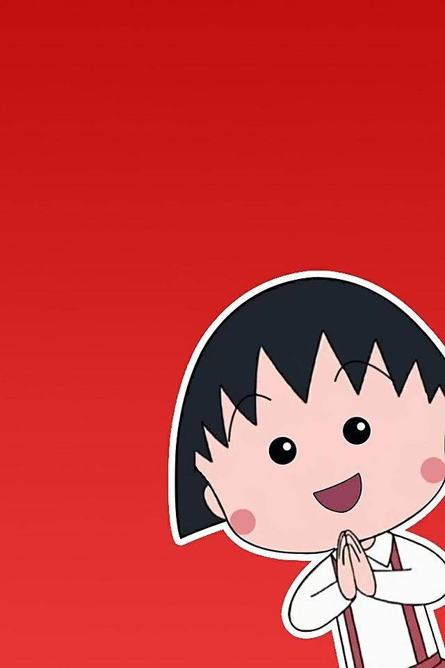 Chibi Maruko Chan 桌布 壁紙 — 一個開心的卡通女孩，黑髮紅潤臉頰，在純紅色背景前微笑並合攏雙手。