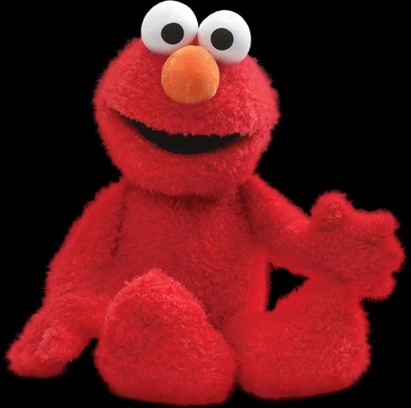 Elmo 桌布 壁紙 — 一個開心的紅色絨毛Elmo玩具坐在黑色背景前，有大眼睛和揮手。