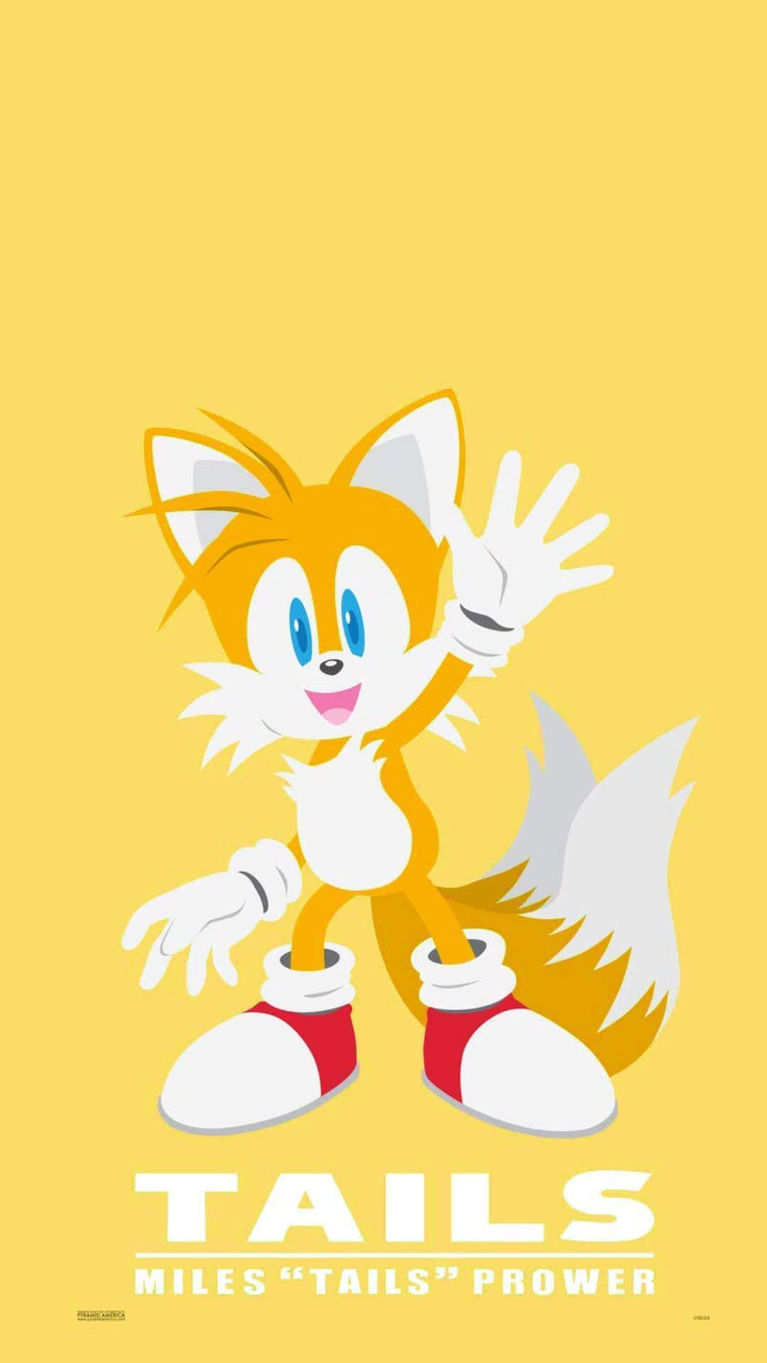 Tails 桌布 壁紙 — 一個開心的雙尾狐狸角色在純黃色背景上愉快地揮手，他的名字顯示在下方。
