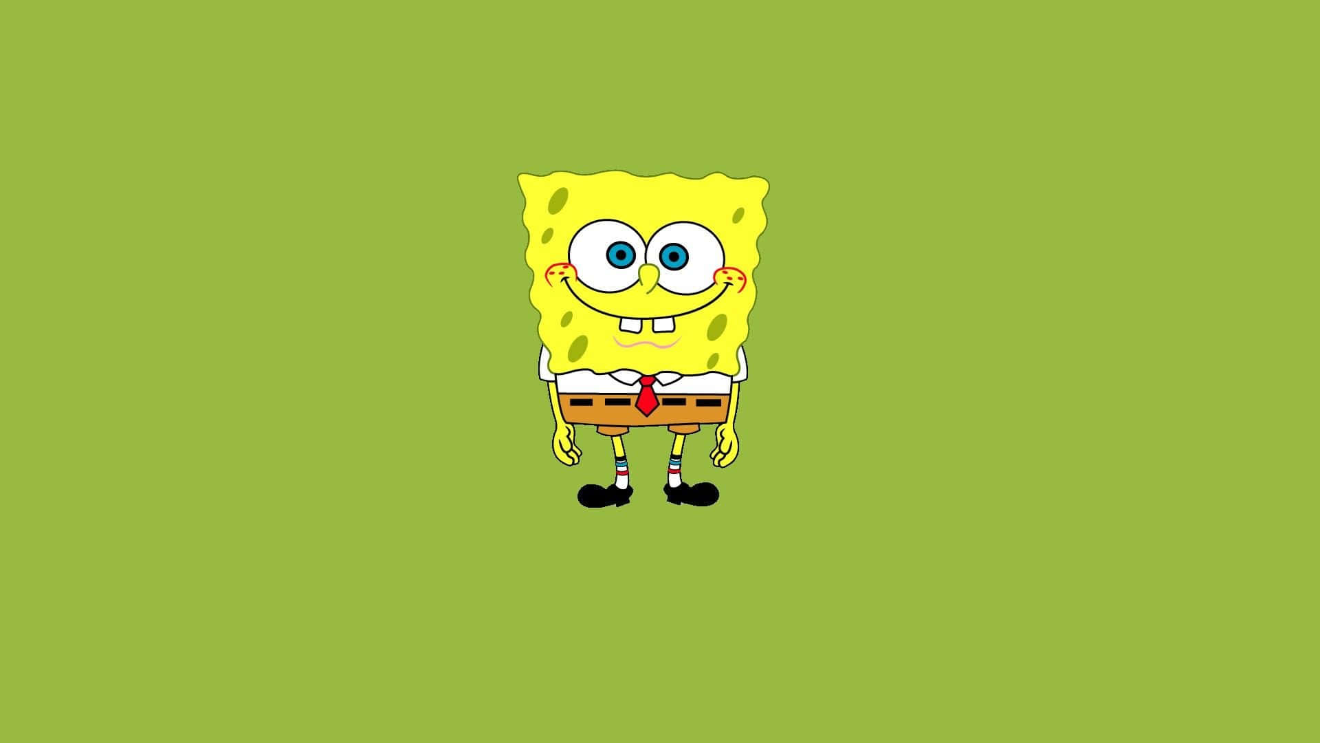 Aesthetic Spongebob Laptop 桌布 壁紙 — 一個開心的黃色卡通海綿角色站在純綠色背景中央，穿著白色襯衫、紅色領帶和棕色短褲。