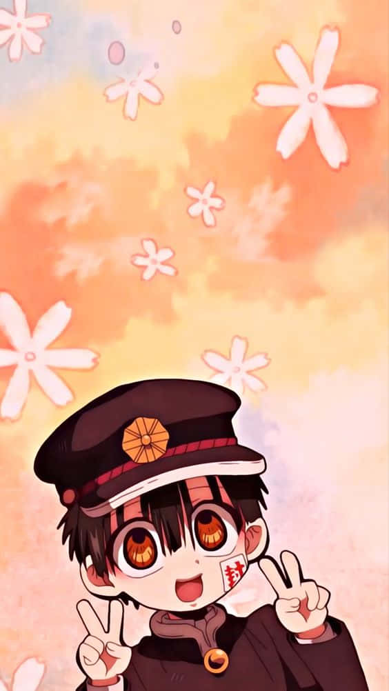 Hanako Kun 桌布 壁紙 — 一個開朗的動畫男孩戴著深色制服帽，在溫暖的夕陽天空下，微笑著比出和平手勢，周圍有白色花朵飄浮。