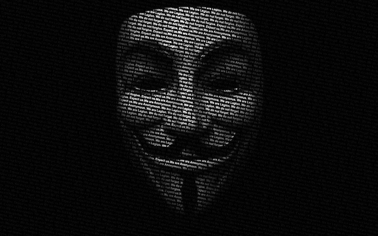 hacker 3d 桌布 壁紙 — 一個陰暗的臉孔從密集的白色文字中浮現，這些文字在黑色背景上重複著 'We are Legion We are Anonymous'。