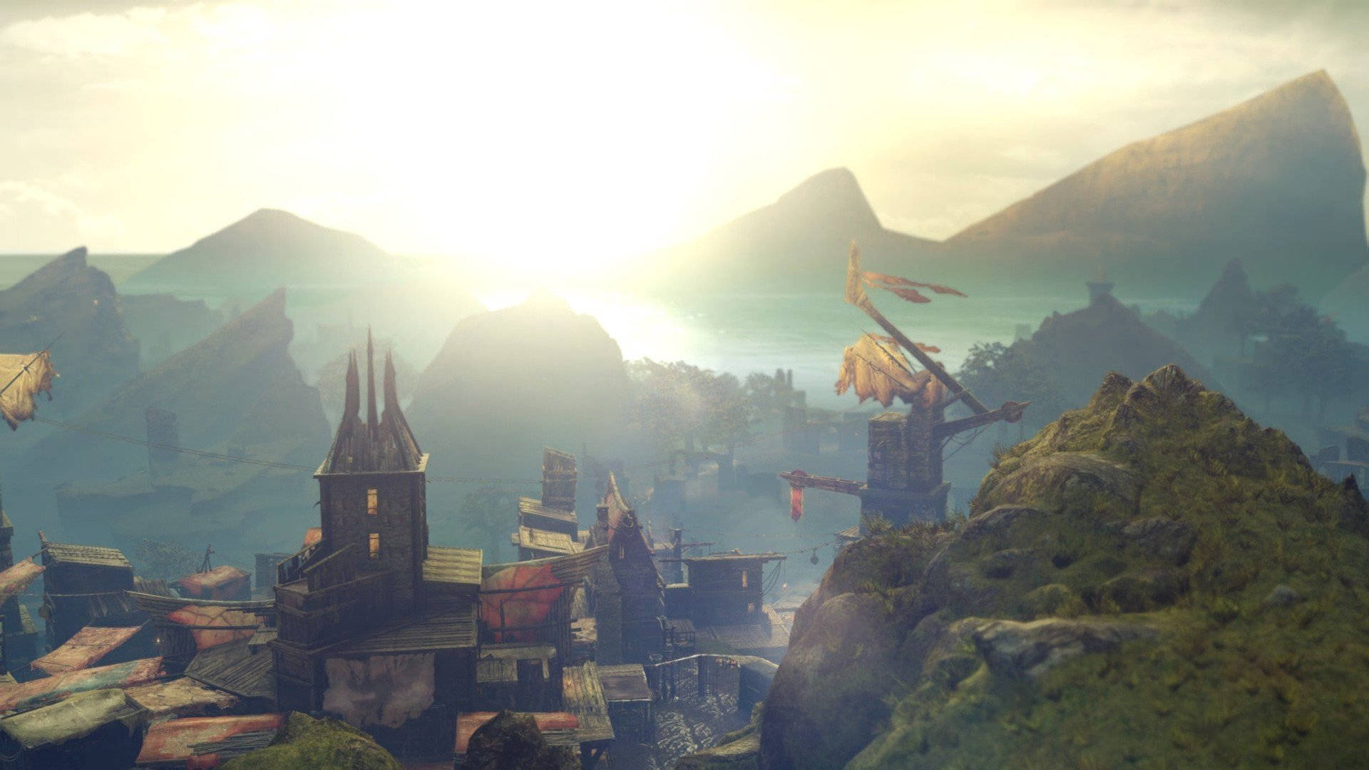 middle earth shadow of war 桌布 壁紙 — 一個陽光普照的奇幻村莊，坐落在崎嶇的山脈之間，有風化的木建築和飄揚的旗幟。