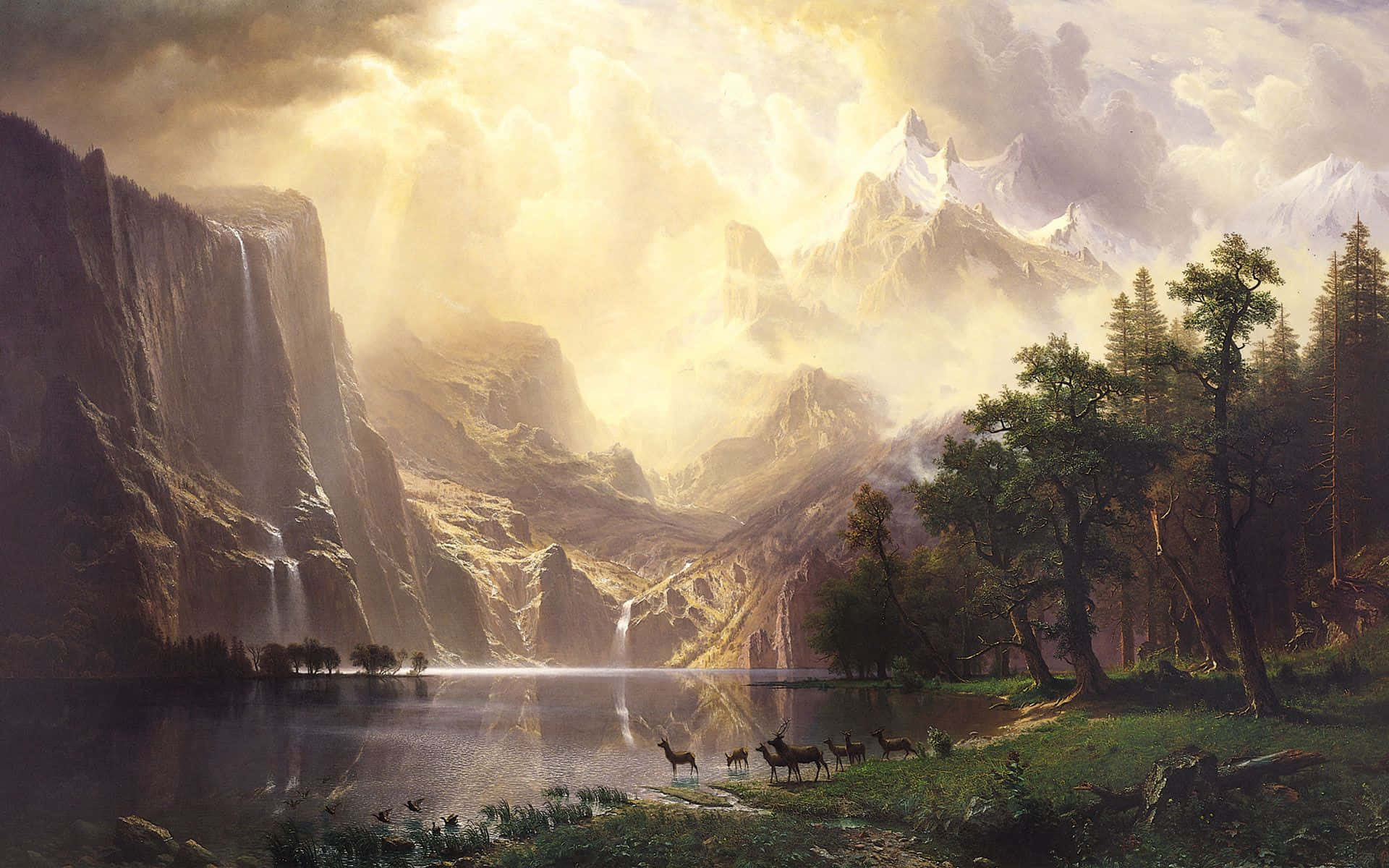 Romanticism 桌布 壁紙 — 一個雄偉的山谷沐浴在金色光芒中，有層疊的瀑布和鹿在寧靜的湖邊吃草。
