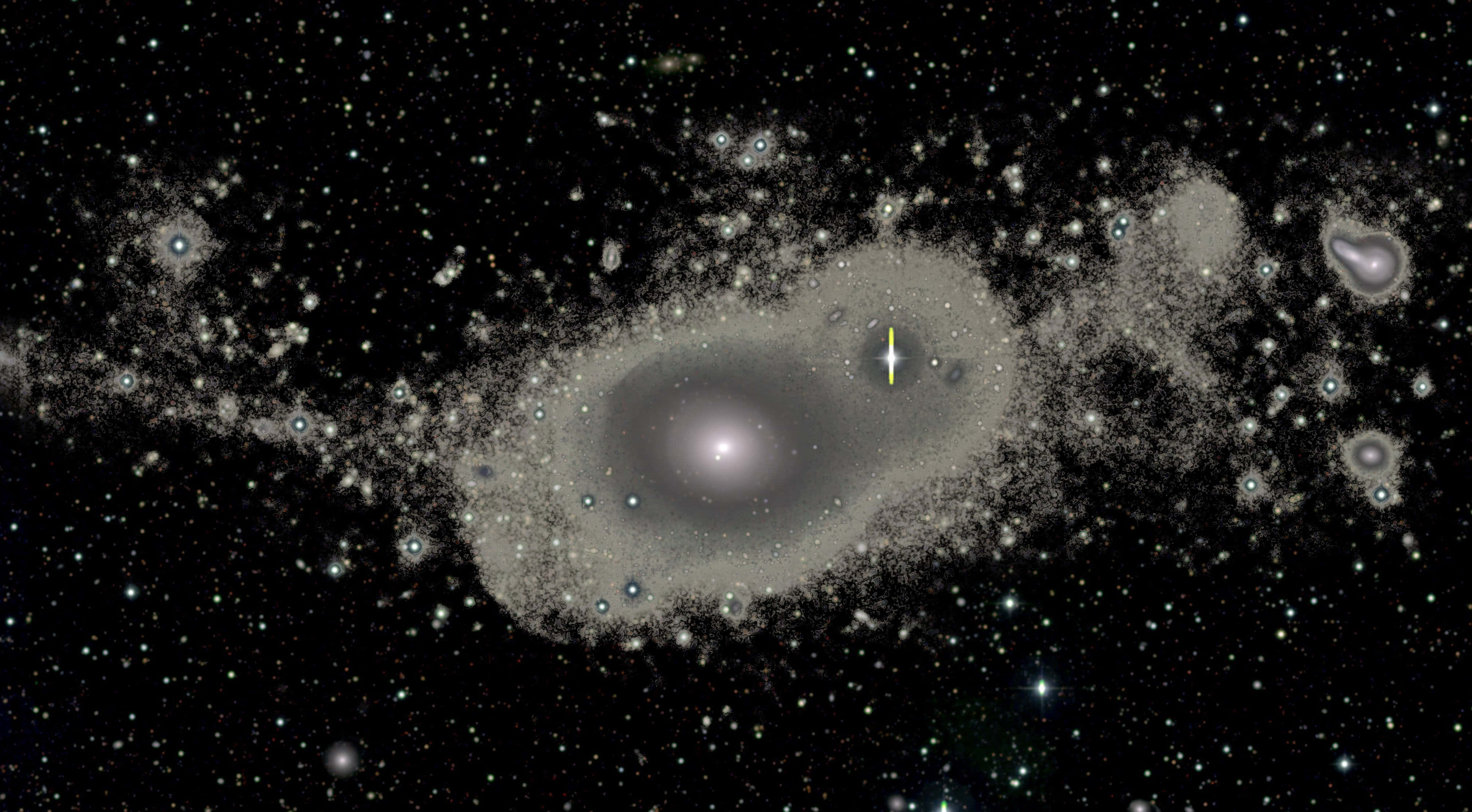Elliptical Galaxy 桌布 壁紙 — 一個雄偉的螺旋星系，擁有明亮的核心和旋轉的旋臂，在遙遠恆星和宇宙塵埃的星場中閃耀。