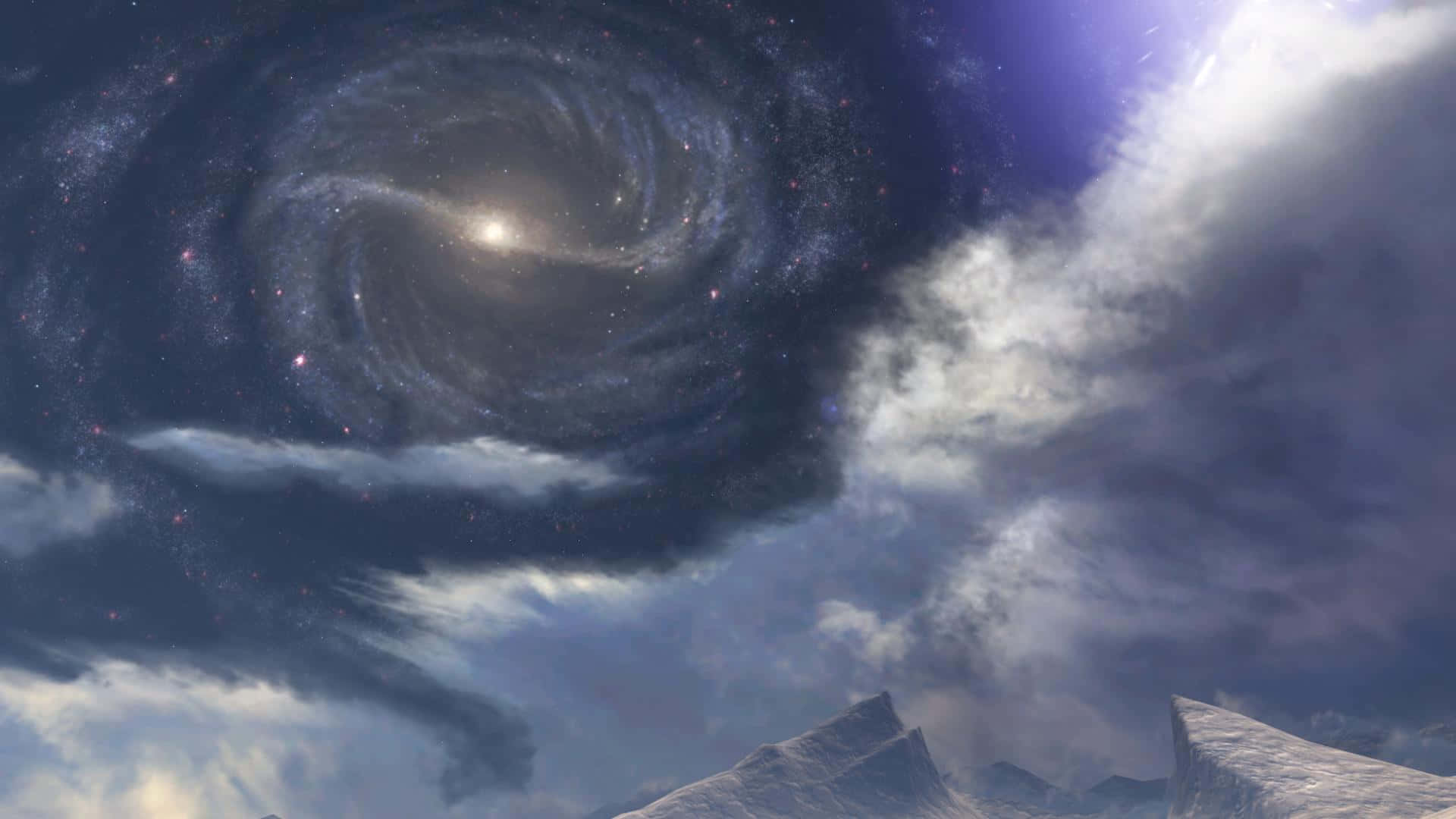 Halo Ark 桌布 壁紙 — 一個雄偉的螺旋星系在戲劇性的多雲天空中，在白雪覆蓋的山峰上方旋轉。