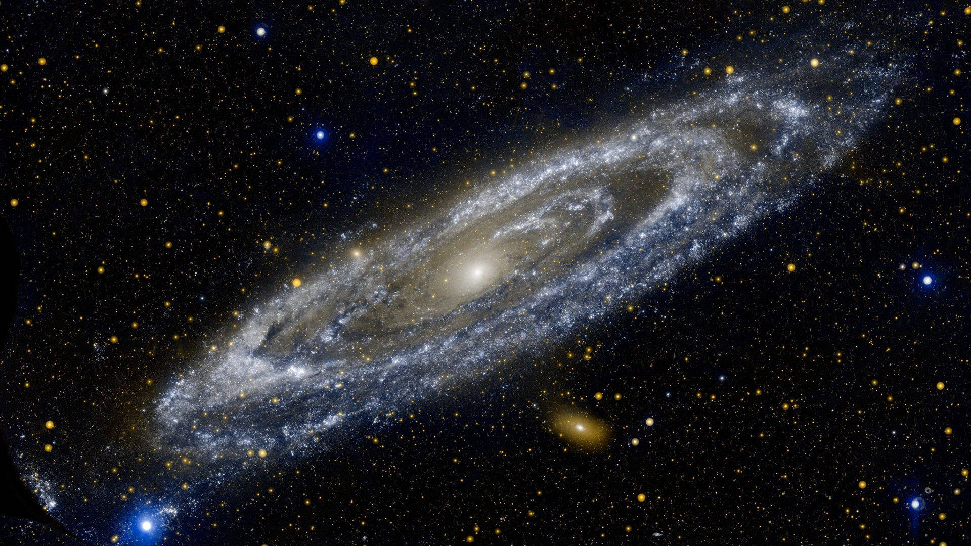 4K ultra HD galaxy 桌布 壁紙 — 一個雄偉的螺旋星系在星場中閃耀著由恆星和宇宙塵埃組成的旋轉臂。
