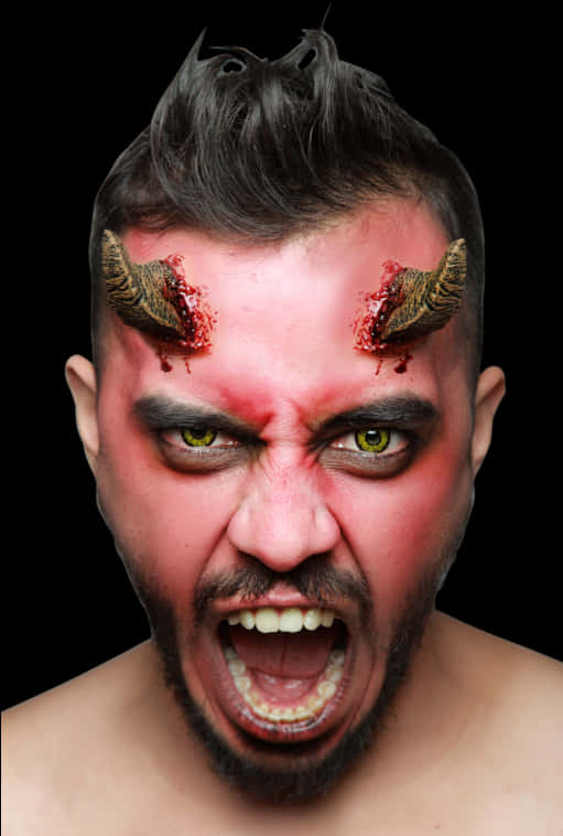 Devil Horn 桌布 壁紙 — 一個頭上有血淋淋的角、眼睛發出綠光的男人，在黑色背景下激烈地尖叫。