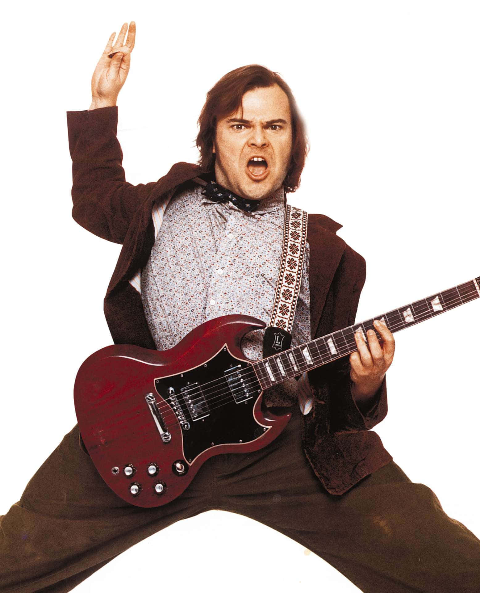 jack black 桌布 壁紙 — 一個頭髮凌亂的男人在純白色背景前尖叫著彈奏紅色電吉他。